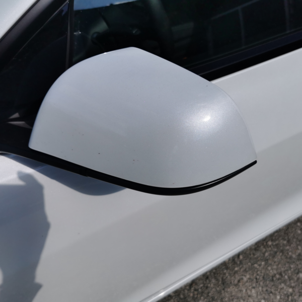 Applied PPF to the left side mirror of the Tesla Model 3