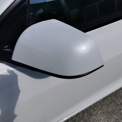 Applied PPF to the left side mirror of the Tesla Model 3